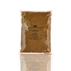 Salty caramel fudge sauce drizzled over soft serve ice cream sundae