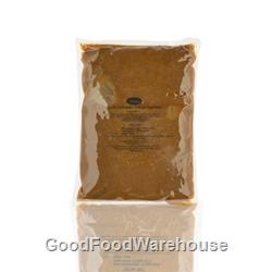 Salty caramel fudge sauce drizzled over soft serve ice cream sundae